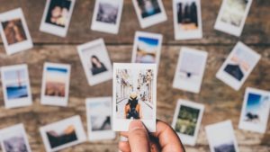 Series of holiday polaroids laid out on a table