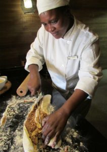 chef slicing fresh made bread at andbeyond sandibe