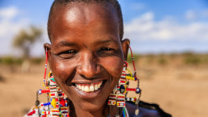 maasai lady with colourful ear rings in kenya