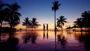 Romantic sunset walk in the Maldives