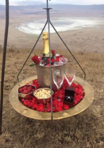 roses champagne and snacks overlooking the ngorongoro crater